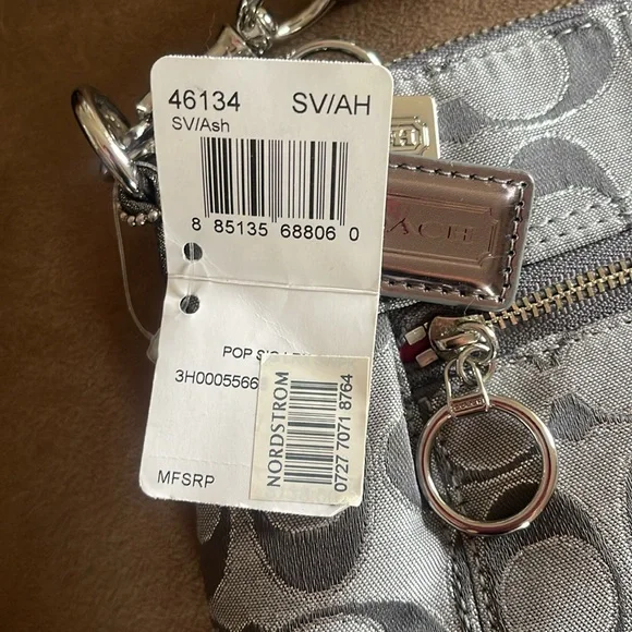 Coach Poppy Signature Crossbody Bag
NWT - Picture 4 of 4